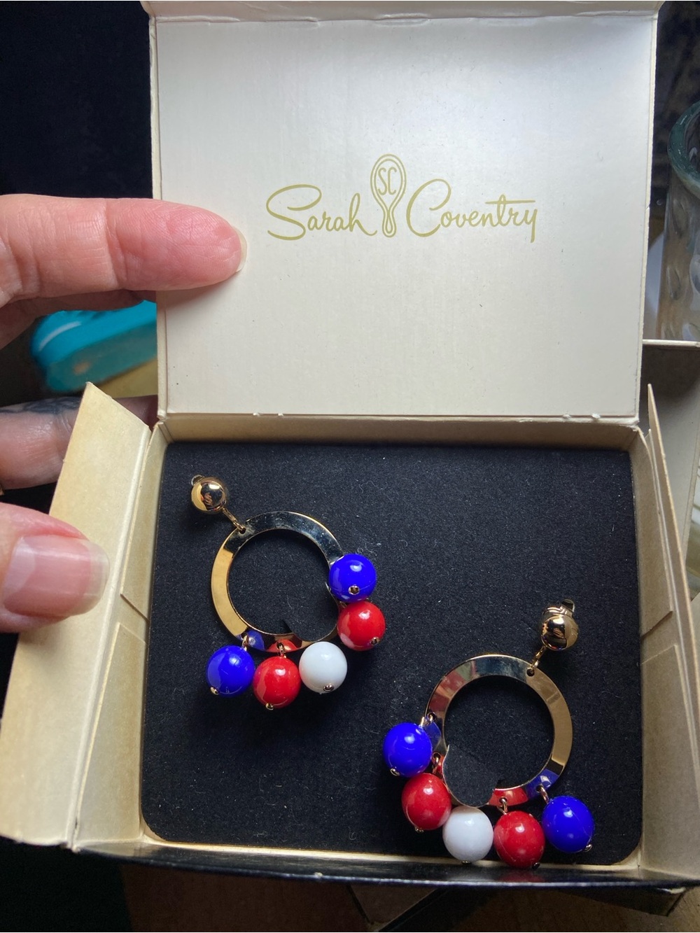 New old stock vintage Sarah Coventry clip on earrings, red white, and blue